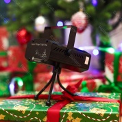 картинка Лазерный мини проектор новогодний Mini Laser Stage Laser Lighting светомузыка стробоскоп для дома